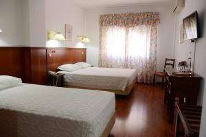 Triple Room with Double Bed room in Estalagem Sequeira