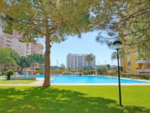 obrázek - Global Properties, Practico apartamento con piscina en Residencial Brezo Canet