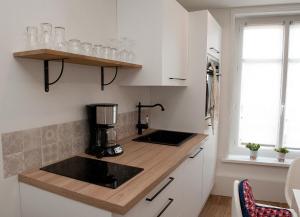 Appartements L'esprit Du Bonheur : photos des chambres