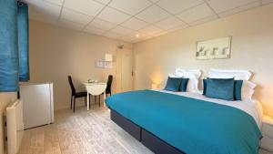 Hotels Hotel des quatre saisons : photos des chambres