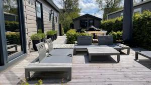 PUUR Eernewoude luxe chalet direct aan open vaarwater gelegen in de Alde Feanen