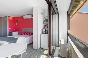 Studio Vue mer panoramique, piscine Port Vénus village naturiste
