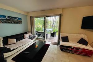 Appartements MAGNIFIQUE Rez de jardin au calme : photos des chambres