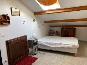 Appartements Loue appartement avec jardin : photos des chambres