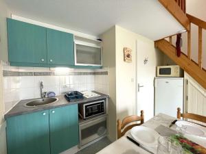 Maisons de vacances Maison T2 mezzanine avec piscine, a 200m de la mer, Bretignolles-sur-Mer - FR-1-224A-54 : photos des chambres