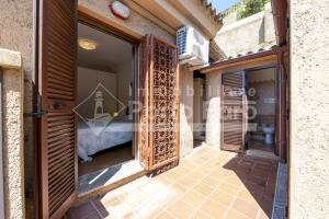 10D - Porto Mannu grazioso bilocale con patio e giardino