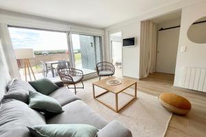 Appartements T3 Neuf Archi Cocooning - Terrasse - Face a la mer : photos des chambres