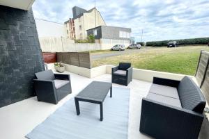 Appartements T3 Neuf Archi Cocooning - Terrasse - Face a la mer : photos des chambres