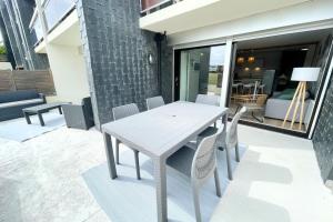 Appartements T3 Neuf Archi Cocooning - Terrasse - Face a la mer : photos des chambres