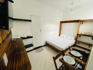 Kitnet encantadora, equipada, conforto no centro