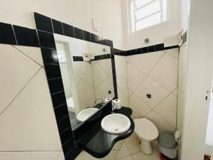 Kitnet encantadora, equipada, conforto no centro