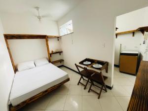 Kitnet encantadora, equipada, conforto no centro