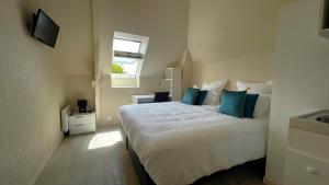 Hotels Hotel des quatre saisons : photos des chambres