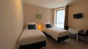 Hotels Hotel des quatre saisons : photos des chambres