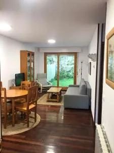 Casa Buganvilla. Apartamento con jardín, a 100 metros del centro. - Comillas