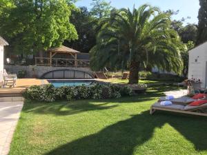 Maisons d'hotes LA MAISON DE LA DUNE - Chambres Climatisees - Jacuzzi 1ere seance offerte - Piscine chauffee avec Abri Amovible - Plage situee a 200m, acces direct par le bois : photos des chambres