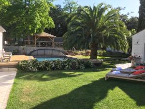 Maisons d'hotes LA MAISON DE LA DUNE - Jacuzzi 1ere seance offerte - Piscine chauffee avec Abri Amovible - Plage situee a 200m, acces direct par le bois : photos des chambres