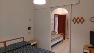 Camera Familiare (2 Adulti + 3 Bambini)