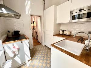 Appartements Agena YourHostHelper : photos des chambres