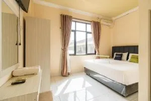 Urbanview Hotel Nugraha Palembang by RedDoorz - Parit