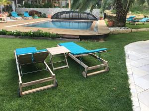 Maisons d'hotes LA MAISON DE LA DUNE - Chambres Climatisees - Jacuzzi 1ere seance offerte - Piscine chauffee avec Abri Amovible - Plage situee a 200m, acces direct par le bois : photos des chambres
