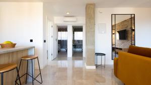 Contemporary loft style apartment with amazing sea views and with direct access to the beach from the community