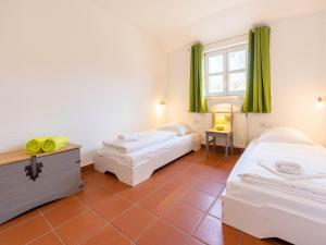 Feriendorf Rugana - Komfortplus Appartement mit 2 Schlafzimmern und Terrasse C06