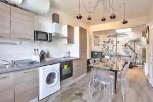 Appartements L'AMIE'NOIS - 6 COUCHAGES - JARDIN - WiFi : photos des chambres