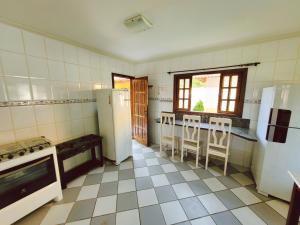 Casa de praia com piscina e playground