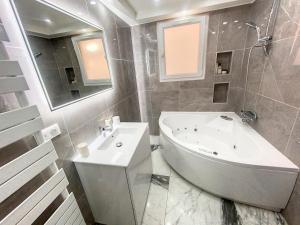 Appartements 3 Pieces climatise en rez de jardin avec piscine : photos des chambres