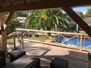 Maisons d'hotes LA MAISON DE LA DUNE - Jacuzzi 1ere seance offerte - Piscine chauffee avec Abri Amovible - Plage situee a 200m, acces direct par le bois : photos des chambres