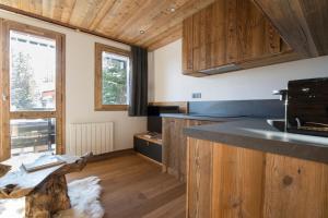 Appartements Les Brigues Courchevel 1550 : photos des chambres