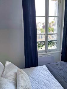 Appartements ☆ Sur les toits de Blois ☆ T2 avec vue Chateau : photos des chambres