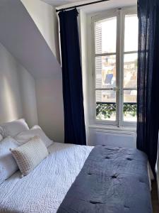 Appartements ☆ Sur les toits de Blois ☆ T2 avec vue Chateau : photos des chambres