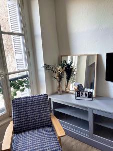 Appartements ☆ Sur les toits de Blois ☆ T2 avec vue Chateau : photos des chambres