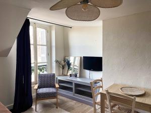 Appartements ☆ Sur les toits de Blois ☆ T2 avec vue Chateau : photos des chambres