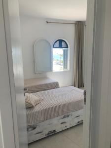 Charmant logement front port et Mer