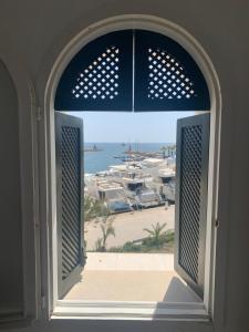 Charmant logement front port et Mer