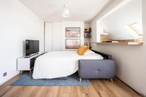 Appartements IDEAL PRO - 10min gare - Hypercentre - WIFI - Longueduree : photos des chambres