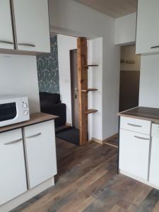 Appartements Bienvenue chez les ch'oups le cocoon : photos des chambres