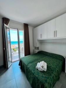 Habitación Doble Deluxe con balcón y vistas al mar