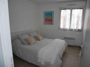 Appartements Charmant T2 *** Coeur de ville : photos des chambres