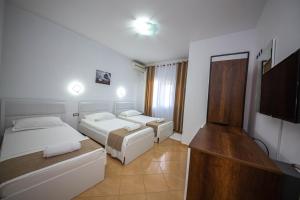 Triple Room with Balcony (3SNG) room in Noan Hotel & Resort