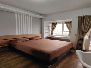 RedLiving Apartemen Margonda Residence 5 - Ens Room with Netflix and Breakfast