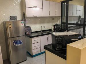 Lux Suites Ndemi Gardens Apartments