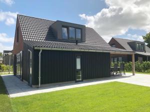 Bungalow 74 op Recreatiepark De Wielen - 4hvězdičkové hotely ve městě Sint Maarten