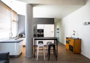 Appartements Le Loft Horloger avec parking : photos des chambres