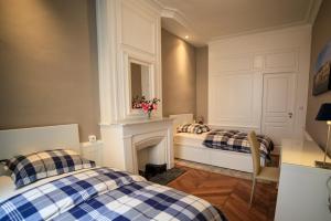 Appartements La Suite Lanterne : photos des chambres