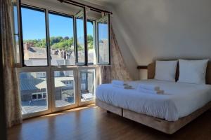 Appartements Happy -  -  Jolie Vue Degagee - Calme - Centre ville : photos des chambres