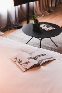 Two-Bedroom Apartment with Balcony room in One Suite Hotel